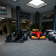 Three Championship-winning IndyCars belonging to Cristiano da Matto, Sèbastian Bourdais and Nigel Mansell in the Newman/Haas facility lobby